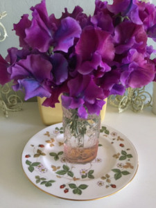 Lizzie's Wedgwood plate and purple flowers in a vase