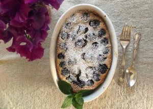 cherry clafoutis in an oval baking dish