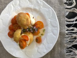 2 Chèvre Puffs on a white plate