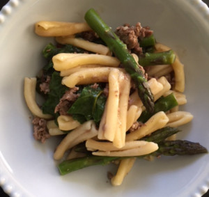 hamburger helper includes asparagus spears, ground beef and your choice of pasta.